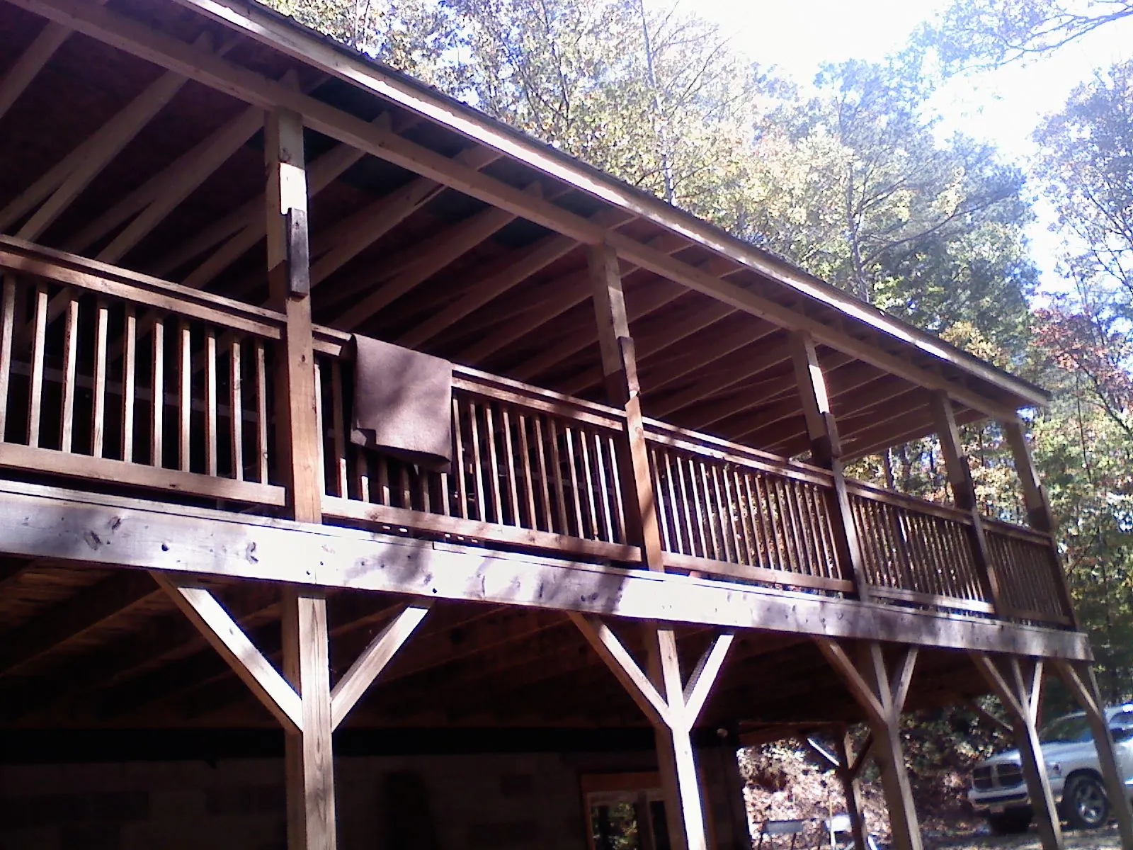Timber framing under a new elevated porch and deck — Roof Leak Repair in Jordan by Roofing Brothers